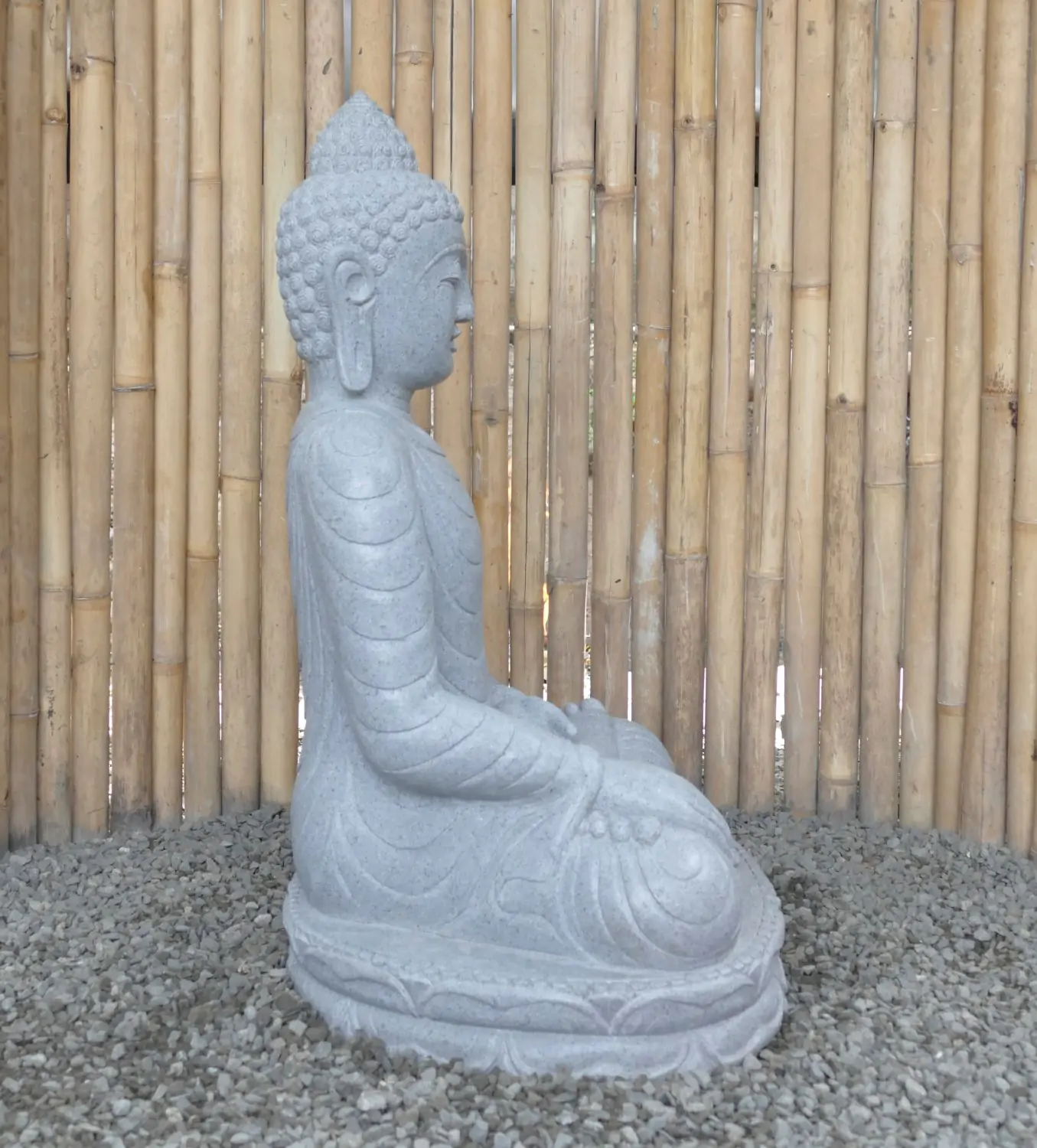  Product image 5 of the product “Seated Buddha made of Riverstone in Bhumisparsha - gesture of touching the earth. 83cm height. ”